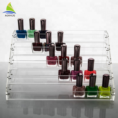 Los estantes de exhibición con gradas de acrílico de la sobremesa sostienen el estante de exhibición de acrílico del esmalte de uñas