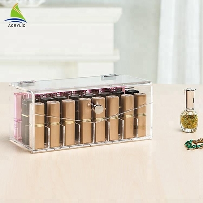 La vitrina de acrílico transparente de la barra de labios del maquillaje compone al organizador